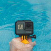 Person holding GoPro Hero in water | Photo: Jacob Owens